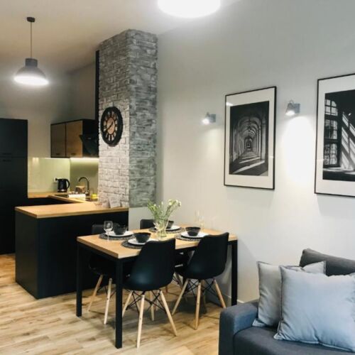 Apartament 4-osobowy na parterze z widokiem na ogród z 2 pomieszczeniami sypialnianymi