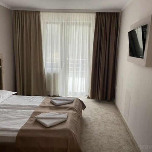 Pokoj s balkónem s manželskou postelí na poschodí