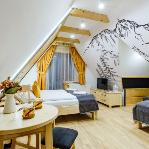 Pokój 3-osobowy na poddaszu Deluxe