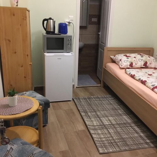 Pokoj s koupelnou pro 1 os. s výhledem do zahrady