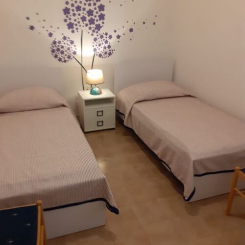 Apartament 4-osobowy na parterze z widokiem na morze z 2 pomieszczeniami sypialnianymi