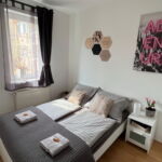 Design 2-Zimmer-Apartment für 4 Personen mit Klimaanlage (Zusatzbett möglich)