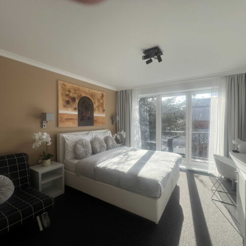 Zuhanyzós Deluxe háromágyas szoba