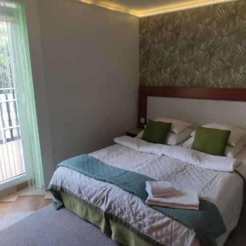 Apartament cu vedere spre gradina cu vedere spre mare cu 2 camere pentru 4 pers.