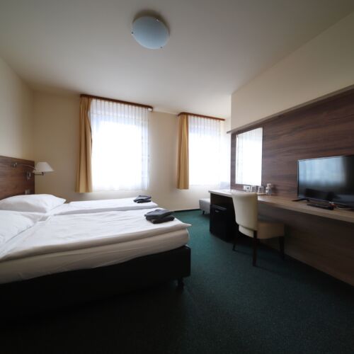 Pokoj s koupelnou pro 1 os. na poschodí (s možností přistýlky)