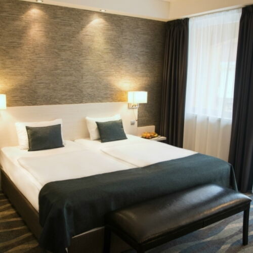 Camera tripla family familial(a)