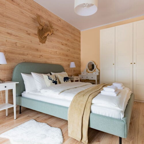 Apartament 4-osobowy w suterenie z widokiem na ogród z 2 pomieszczeniami sypialnianymi