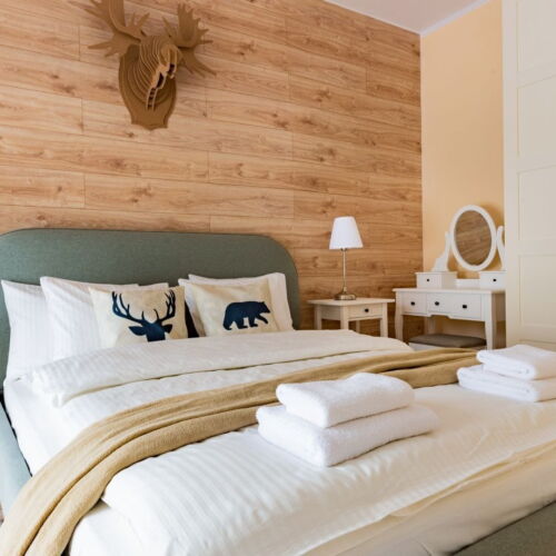 Apartament 4-osobowy w suterenie z widokiem na ogród z 2 pomieszczeniami sypialnianymi