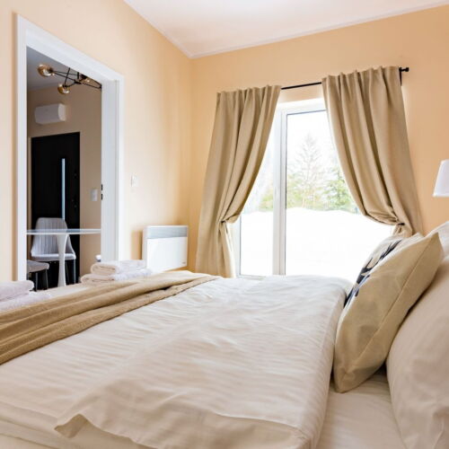 Apartament 4-osobowy w suterenie z widokiem na ogród z 2 pomieszczeniami sypialnianymi