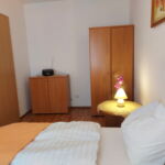 Emeleti erkélyes 4 fős apartman 1 hálótérrel