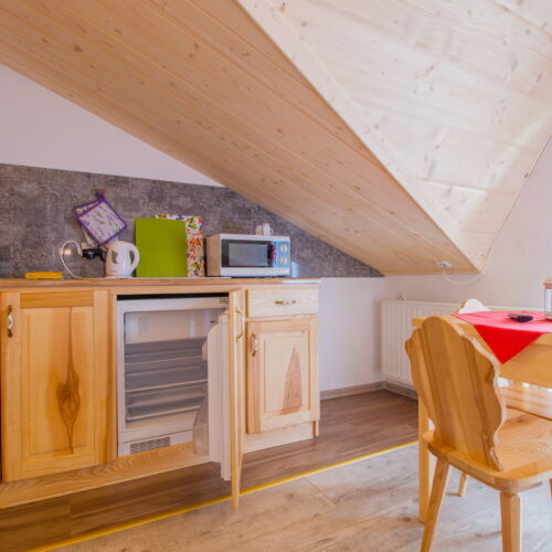 Pokoj s vlastní kuchyňkou  s manželskou postelí