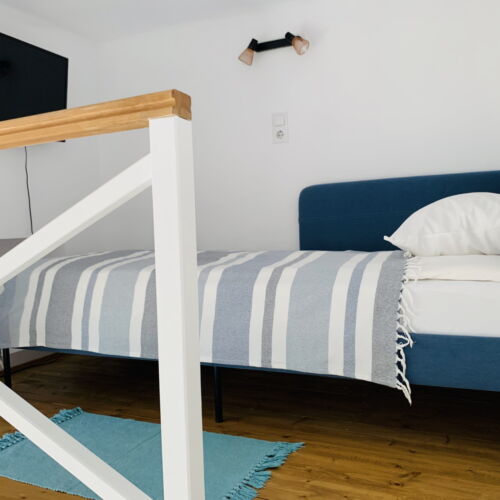 Camera single maisonetă