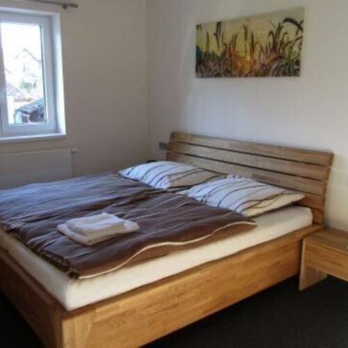 Pokoj se sprchou se společnou kuchyňkou pro 4 os.