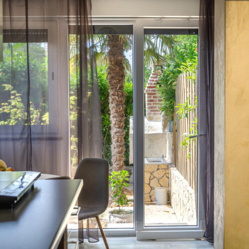 Apartament 4-osobowy na parterze z dostępem do ogrodu z 2 pomieszczeniami sypialnianymi