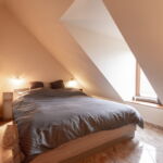 Apartman (jako celek) s manželskou postelí s výhledem na hrad v podkroví (s možností přistýlky)