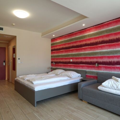 Pokój 4-osobowy z balkonem z widokiem na ogród