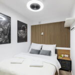 Apartament 4-osobowy w suterenie Standard Plus z 2 pomieszczeniami sypialnianymi