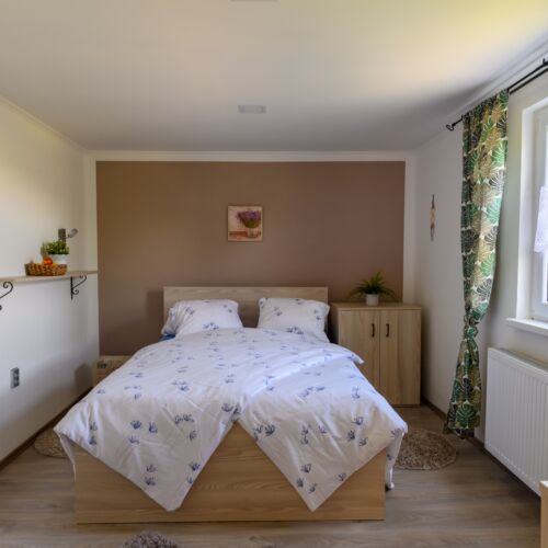 Rekreační dům (jako celek) se sprchou se zahradou pro 7 os. (s možností přistýlky)