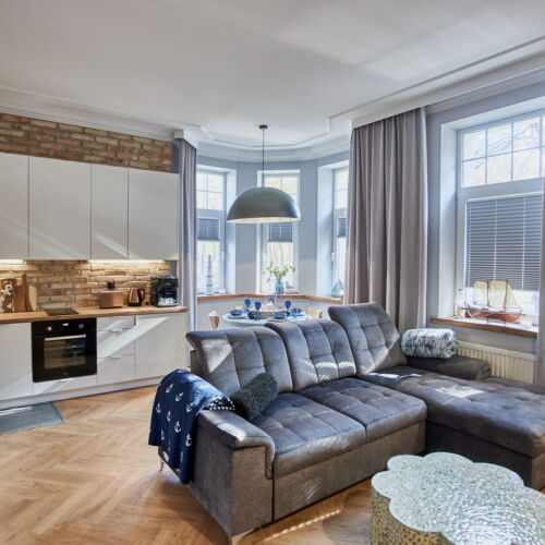 Apartament 4-osobowy na parterze z balkonem z 2 pomieszczeniami sypialnianymi