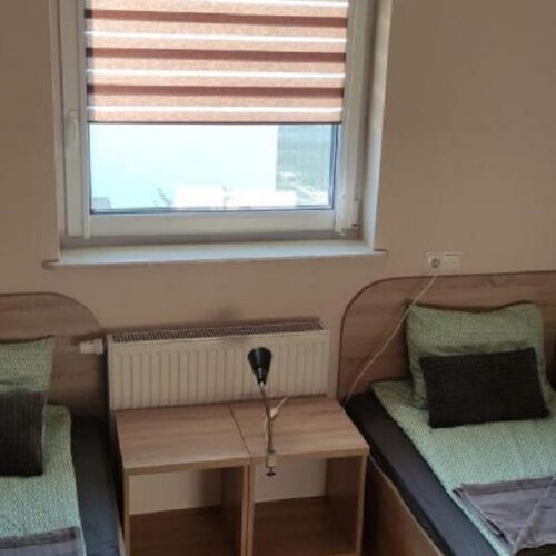 Camera twin la etaj cu vedere spre gradina