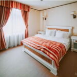 Exclusive  Apartmán s manželskou posteľou s 1 spálňou (s možnosťou prístelky)