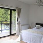 Suita s balkónem  s manželskou postelí s 1 ložnicí (s možností přistýlky)