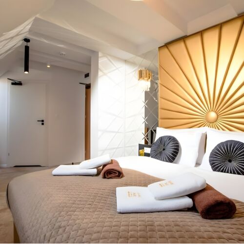 Camera tripla la mansardă