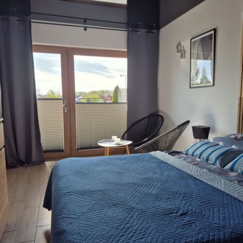 Pokoj s koupelnou s manželskou postelí přízemní