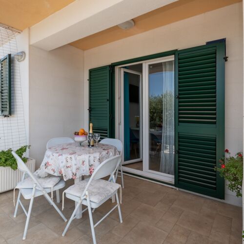 Apartament 4-osobowy z klimatyzacją z tarasem z 1 pomieszczeniem sypialnianym A-19516-c