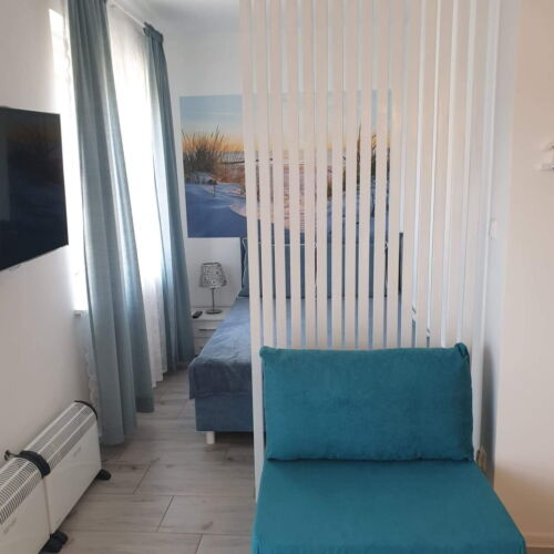 Apartament 4-osobowy na piętrze z balkonem z 2 pomieszczeniami sypialnianymi
