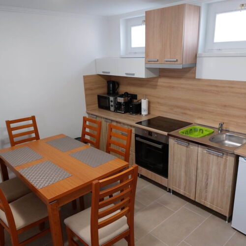 Apartman pro 5 os. se 2 ložnicemi s výhledem do zahrady přízemní