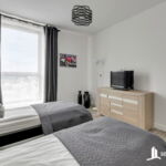 Apartament 4-osobowy na piętrze z widokiem na morze z 2 pomieszczeniami sypialnianymi (możliwa dostawka)