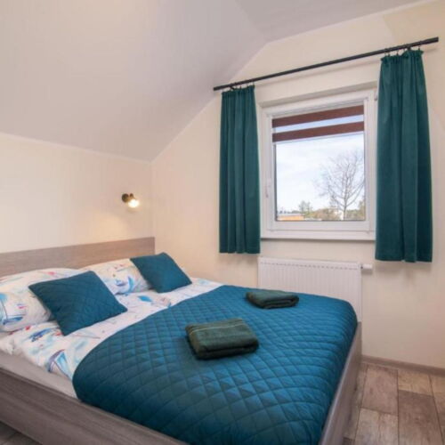 Domek letniskowy 6-osobowy Family z widokiem na ogród