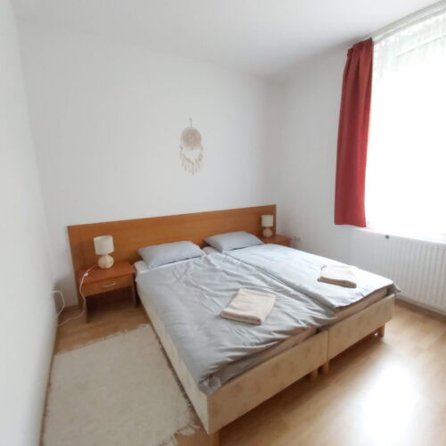 Apartman s terasou pro 4 os. se 2 ložnicemi s výhledem do zahrady