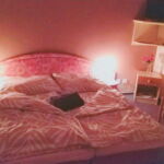 Dvoulůžkový pokoj s manželskou postelí a masážní vanou
