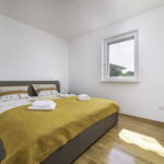 Apartament 4-osobowy na piętrze z 2 pomieszczeniami sypialnianymi (możliwa dostawka)