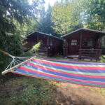 Camping Floare de Colţ - Casuţe de lemn și locuri pentru cort Rimetea