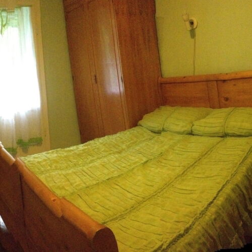 Pokoj s balkónem s manželskou postelí na poschodí