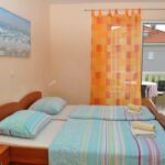 Apartament cu aer condiționat cu vedere spre mare cu 2 camere pentru 5 pers. A-14667-a