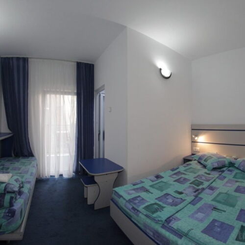 Camera dubla la parter cu balcon