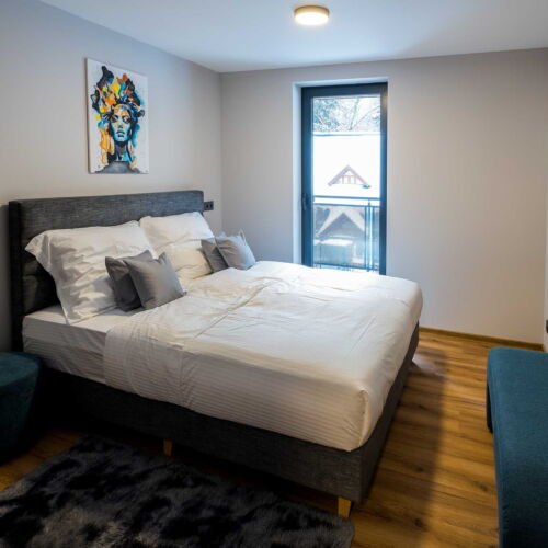 Apartman s balkónem  s manželskou postelí s 1 ložnicí (s možností přistýlky)