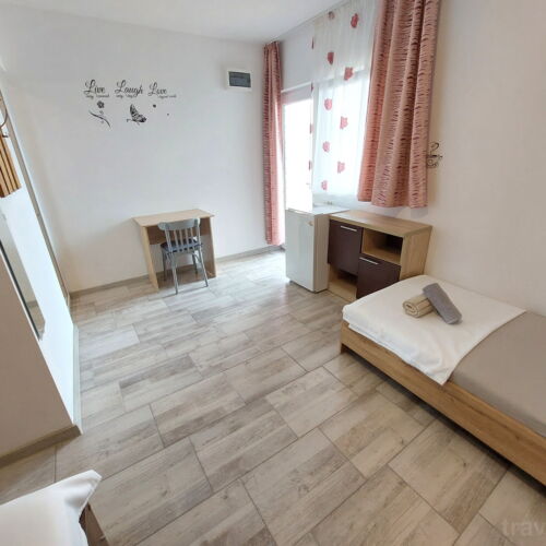 Camera tripla superior