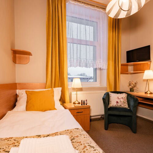 Pokoj se sprchou s vlastní kuchyňkou pro 1 os.