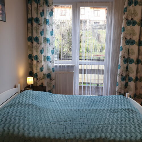 Camera dubla cu vedere spre grădină