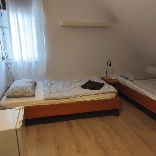 Pokój 4-osobowy ze wspólną łazienką ze wspólnym aneksem kuchennym