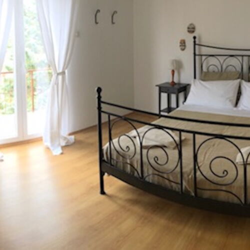 Apartament la etaj cu vedere spre grădină cu 2 camere pentru 4 pers.