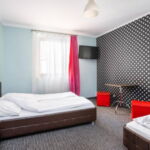 Triple Room with LCD/Plasma TV and Shared Bathroom