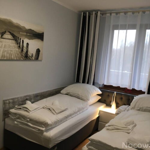 Apartament 4-osobowy z balkonem z łazienką z 1 pomieszczeniem sypialnianym