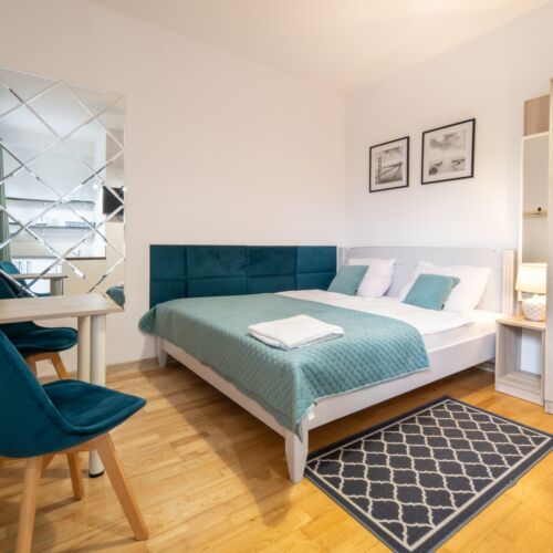 Apartament 2-osobowy z łazienką z tarasem z 1 pomieszczeniem sypialnianym