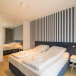 Apartament 4-osobowy z 2 pomieszczeniami sypialnianymi